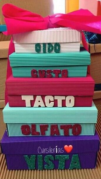 stack of taco boxes with the words fiesta written on them and a pink bow