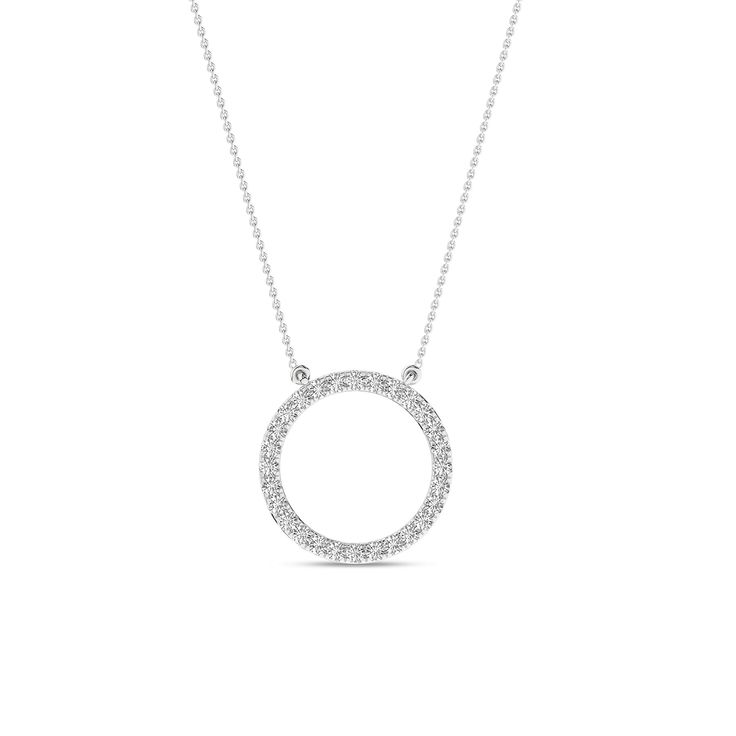 The Circular Silhouette Necklace is a testament to timeless style. It has a diamond-studded circular pendant that captures the essence of enduring love. This piece transforms any ensemble into a captivating look. It’s more than just a necklace; it’s a circle of endless possibilities. White Gold Pave Setting Round Pendant Necklace, White Gold Necklace With Pave Setting And Round Pendant, White Gold Round Pendant Necklace With Pave Setting, Fine Jewelry White Gold Round Necklace, Fine Jewelry White Gold Circle Necklace, Anniversary Necklace With Pave Setting In Round Pendant, Fine Jewelry Brilliant Cut Diamond Circle Necklace, Anniversary Necklaces With Pave Setting In Round Pendant, Classic Round Diamond Necklace With Halo Design