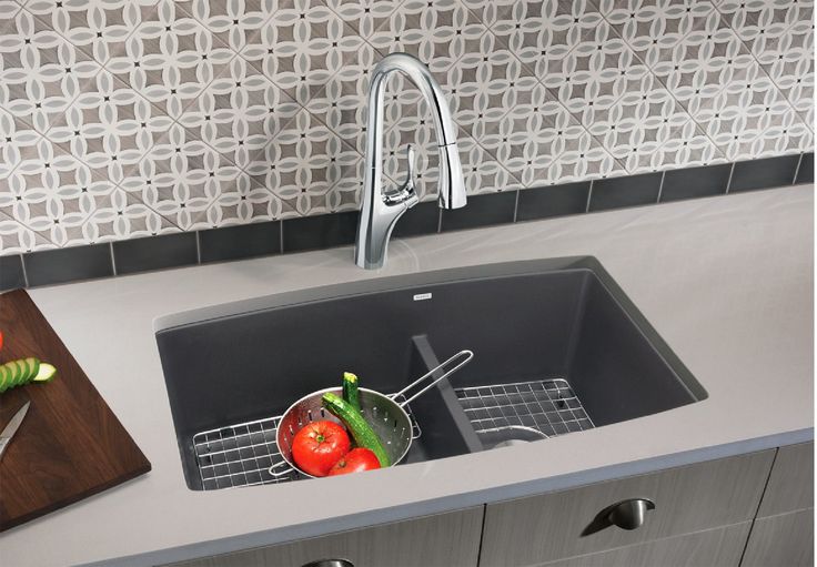 the sink is clean and ready to be used in the kitchen or for cooking purposes