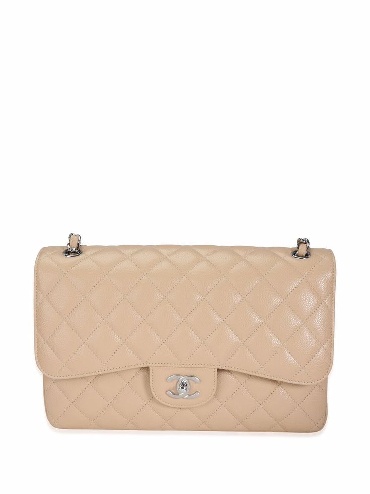 Cream beige caviar leather Jumbo Double Flap shoulder bag from Chanel Pre-Owned featuring diamond quilting, signature double flap closure, signature interlocking CC turn-lock fastening, concealed front press-stud fastening, two leather and chain-link shoulder straps, rear patch pocket, signature stitched interlocking CC logo, internal logo stamp, internal patch pockets, leather lining, silver-tone hardware and rectangle body. POSITIVELY CONSCIOUS: Purchasing this item continues its narrative and Flap Shoulder Bag, Shopping Chanel, Cream Beige, Van Cleef Arpels, Logo Stamp, Cc Logo, Press Studs, Lady Dior, Lalique