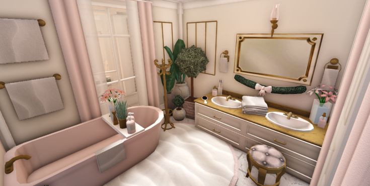 the bathroom is decorated in pastel pink and gold with white towels on the bathtub