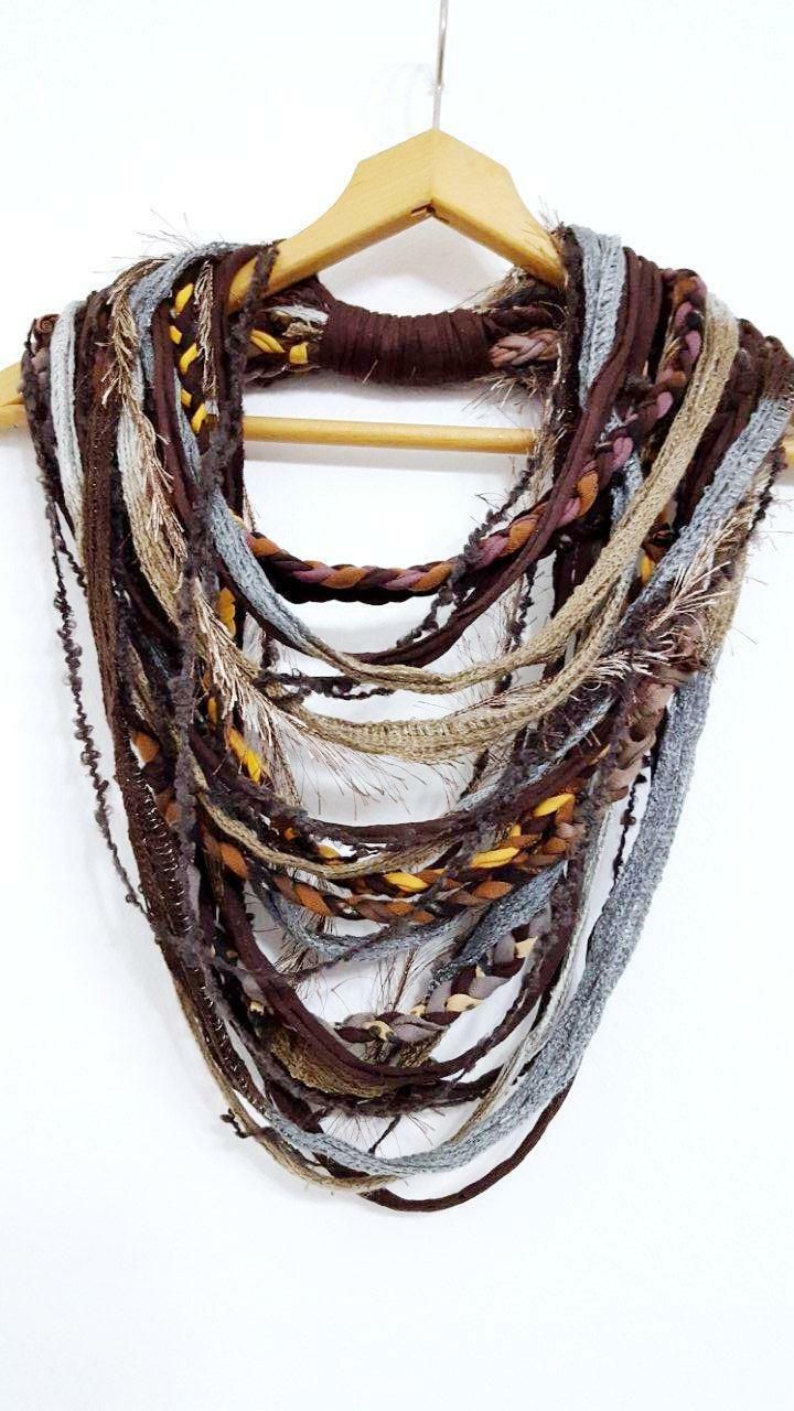 BEAUTIFUL, HANDMADE, SCARF NECKLACE, AUTUMN SHADES Product description: Handmade, multi-strand  hand cut fabric threads and various different yarns and braids,  unusual and beautiful neck wrap.  This piece will make you fashionable and bring any clothing to life. FUN TO WEAR FABRIC JEWELRY BY UNIKATINA Check out for more similar accessories   HERE.  Payment:                 We only accept pay pal. Shipping: I ship WORLDWIDE Economy Int'l Shipping (set to Priority if You want  faster delivery and Avatar Clan, Beautiful Neck, Handmade Scarf, Scarf Necklace, Fabric Necklace, Hippie Necklace, Wear Necklaces, Neck Wrap, Cool Necklaces