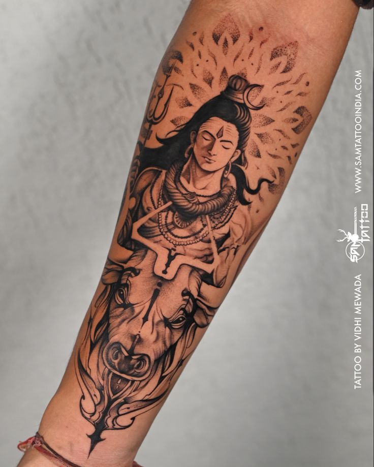 a woman's arm with a tattoo on it