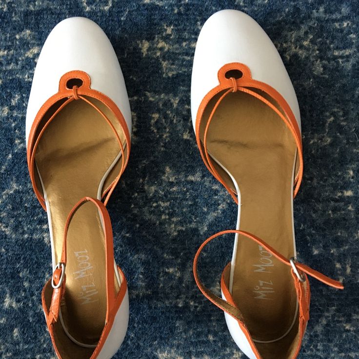 Adorable White Leather Heels With Kitten Heel. Has Orange Accents Throughout. Brand New. Never Worn. Please Take Note: Inner Lining Is Synthetic. Sensitive To Scratches/Use. Orange Kitten, Miz Mooz Shoes, Orange Kittens, Kitten Heel Shoes, Sunset Orange, Miz Mooz, Orange Accents, Kitten Heel, Heel Shoes