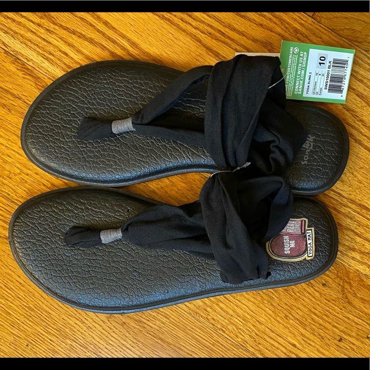 This Comfy Sanuk Sandal Is Made From Yoga Mat Material, Has A Solid Black Thong Sling Upper, Nwt, Noting A Small Insole Divot Right Of Left Shoe Thong Post. Size 10 #Petfree #Smokefree Black Slip-on Sandals With Adjustable Strap, Comfortable Black Synthetic Slingback Sandals, Adjustable Black Slingback Sandals For Spring, Black Adjustable Slingback Sandals For Spring, Lightweight Black Sandals For The Beach, Lightweight Black Sandals For Beach, Adjustable Non-slip Black Sandals, Black Adjustable Non-slip Sandals, Black Slingback Beach Sandals