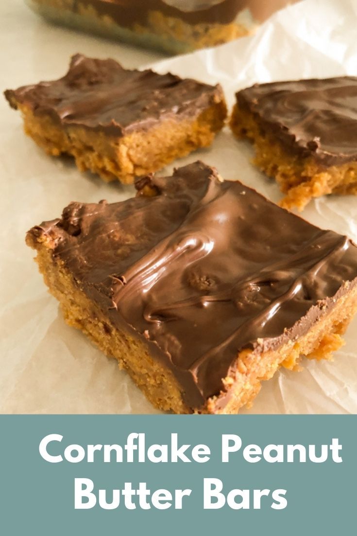 four peanut butter bars with chocolate frosting on top and the words cornflake peanut butter bars