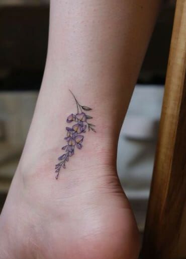 Mini Wisteria Tattoo Purple Wisteria Tattoo, Wisteria Branch Tattoo, Demon Slayer Wisteria Tattoo, Fine Line Wisteria Tattoo, Wisteria Tattoo Black, Wisteria Tattoo Black And White, Wisteria Tattoo Foot, Wisteria Tattoo Design, Japanese Wisteria Tattoo