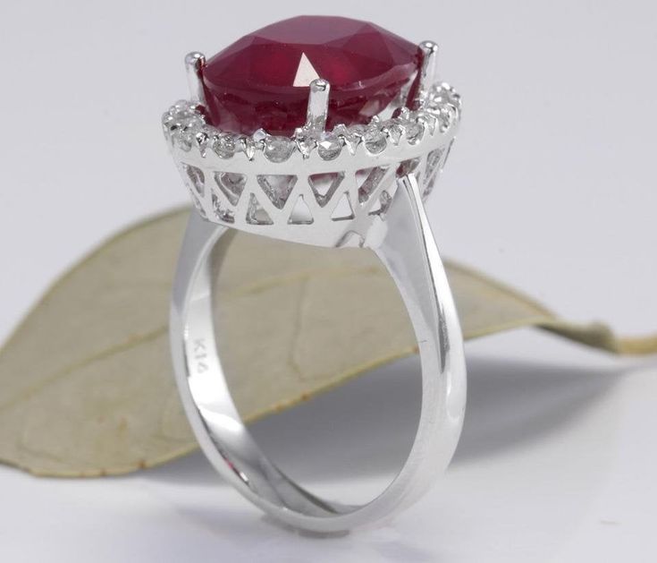 9.65 Carats Impressive Natural Red Ruby and Diamond 14K White Gold Ring Suggested Replacement Value: $7,600.00 Total Red Ruby Weight is: Approx. 8.75 Carats (Lead Glass Filled) Ruby Measures: Approx. 13.03 x 10.89mm Natural Round Diamonds Weight: Approx. 0.90 Carats (color G-H / Clarity SI1-2) Ring total weight: Approx. 7.4 grams Disclaimer: all weights, measurements and colors are approximate and may vary slightly from the listed dimensions or as seen in the image. All pictures are magnified to Emerald Cut Aquamarine Ring, Emerald Cut Rings, Etsy Gold Ring, Red Band, Natural Tanzanite, Aquamarine Rings, Leaded Glass, Red Ruby, 14k White Gold Ring