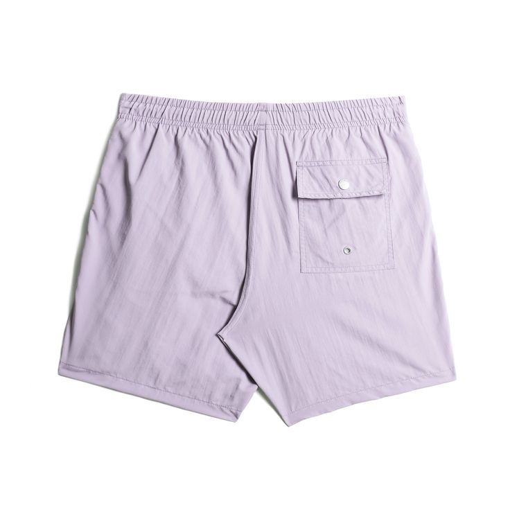 The signature Swim Trunk cut features an elasticized waist with an ultra fine four-way stretch mesh lining, quick-dry shell, custom-tipped drawstrings and back pocket snap enclosure. Fits true to size. Shell: 100% recycled quick-dry nylon Lining: 90% Nylon 10% Spandex Ultra Fine Mesh Reinforced Deep Side Pockets Back Pocket With Bather Snap Enclosure 5.5 Inch Inseam Made in Canada Summer Nylon Swim Trunks With Side Pockets, Nylon Swim Trunks With Side Pockets, Nylon Swim Trunks With Side Pockets For Outdoor, Outdoor Nylon Swim Trunks With Side Pockets, Nylon Swim Trunks With Pockets For Travel, Functional Nylon Swimwear With Side Pockets, Solid Stretch Swim Trunks With Pockets, Relaxed Fit Solid Swim Trunks For Spring, Spring Solid Color Relaxed Fit Swim Trunks