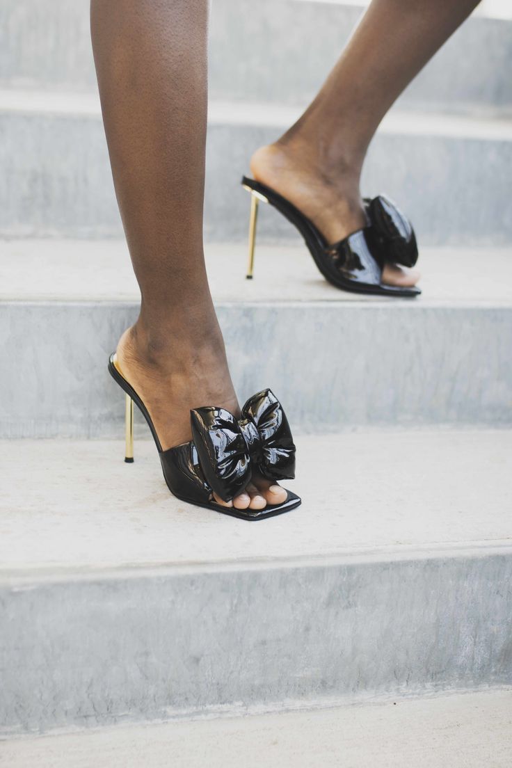 Pin-heel sandal with an exaggerated bow. Fits true to size Measurements taken from a size 7 4.5" heel Synthetic Upper, Leather Lining, Synthetic Sole Jeffrey Campbell Heels, J Cole, Heels & Wedges, Jeffrey Campbell, Kitten Heels, Sandals Heels, Wedges, Size 7, Sandals