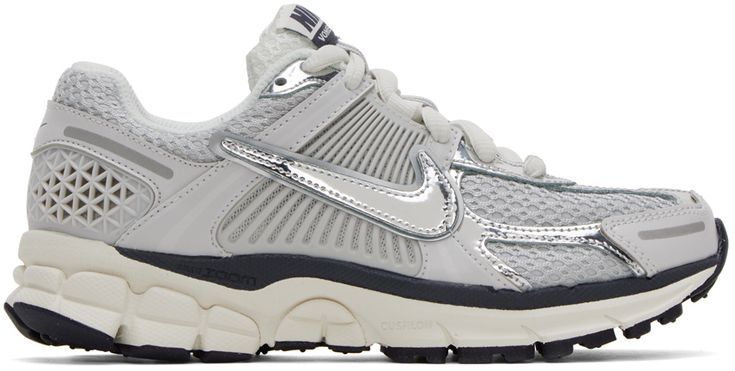 Low-top mesh and rubberized sneakers in gray. Metallic silver-tone trim throughout. · Lace-up closure · Padded tongue and collar · Signature Swoosh appliqué at sides · Cushlon foam rubber midsole · Treaded rubber outsole Please note that this item may be shipped only within North America. Supplier color: Photon dust/Chrome/Gridiron Silver Low-top Sneakers With Rubber Sole, Sporty Silver Sneakers With Perforations, Gray Sneakers With Reflective Details For Streetwear, Silver Running Shoes With Perforations For Light Sports, Silver Sneakers With Rubber Sole For Streetwear, Sporty Gray High-top Sneakers With Perforations, Silver Sports Sneakers With Perforations, Silver Sneakers For Sports With Perforations, Mesh Sneakers With Reflective Details And Round Toe