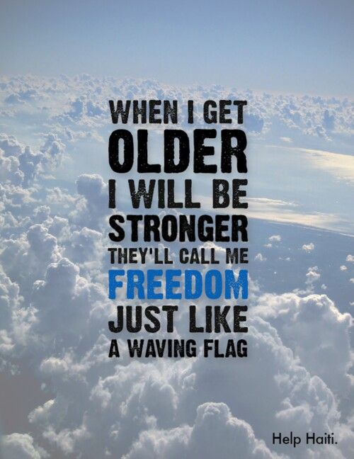 an airplane wing with the words, when i get older i will be stronger they'll call me freedom just like a waking flag