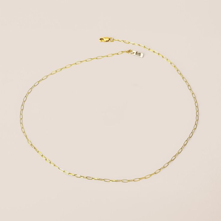 A modern twist on a classic chain Necklace. This beautiful, minimalist necklace is crafted from high-quality 14k gold fill, 14k rose gold fill, or sterling silver and features a delicate paperclip chain. The perfect accessory for any outfit, this versatile necklace can be worn as a choker or a longer style necklace and is great for stringing your favorite charms. A great choice for everyday wear, this timeless piece will make a wonderful addition to your jewelry collection. 20 Inch Necklace, Paperclip Chain Necklace, Princess Necklace, Round Necklace, Wear Necklaces, Month Gifts, Necklace Chain Lengths, Short Necklace, Minimalist Necklace