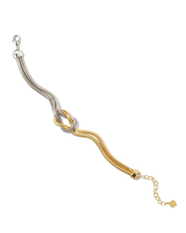 With its texture, dimension, and classic love knot design, the Annie Chain Bracelet in Mixed Metal checks all our boxes for a wrist stack staple. Two snake chains of 14k gold over brass and rhodium over brass are interwoven to create a symbol of love and unity for a subtly sentimental style. Trendsetting yet timeless, this bracelet is the staple you’ll style again and again. Metal 14k Yellow Gold Over Brass, Rhodium Over Brass Closure Lobster Clasp Size 6.5" Chain With 1.5" Extender, 0.80"L X 0. Gold And Silver Jewelry Together Mixed Metals, Wrist Stack, Mixed Metal Bracelets, Classic Love, Wrist Stacks, Mixed Metal Jewelry, Closet Door, Knot Design, Climber Earrings