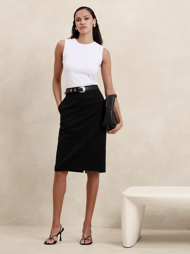 Indulgent and elegant, this expertly tailored pencil skirt elevates any wardrobe with a luxurious wool fabrication and a darted waist to accentuate in stunning proportions.  PENCIL SKIRT FIT: High rise, fitted from hip to hem.  RESPONSIBLE WOOL STANDARD CERTIFIED (Control Union Certifications CU 862581): This global standard protects the sheep that supply the wool for this sweater as well as the land they graze, working to make it better for the environment and the sheep.  Certified by NSF Certi Banker Outfits, Office Fits, Work Skirt, Color Blocking Outfits, Pencil Skirt Outfits, Corporate Outfits, Wool Pencil Skirt, Work Skirts, Animal Farm