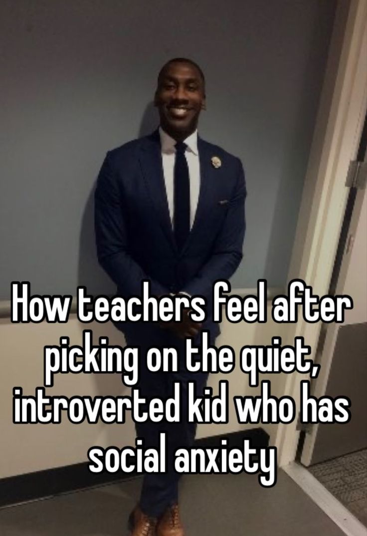 a man wearing a suit and tie standing in front of a wall with the words how teachers