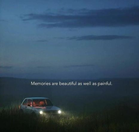 a car parked in the middle of a field at night with an inspirational quote above it