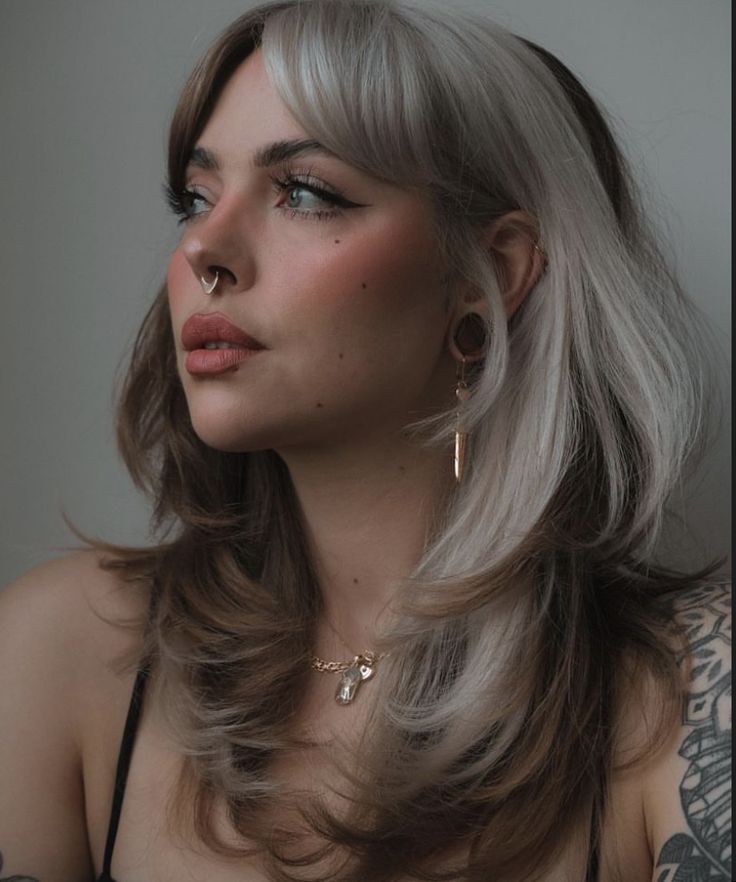 Shag Hair On Round Face, Blonde Hair Dark Peekaboo, Bangs And Layered Hair Shoulder Length, Block Placement Hair, Alt Women Haircut, Bold Hair Colors For Pale Skin, Women’s Edgy Haircuts, Stylish Long Haircut, Patchwork Hair Color