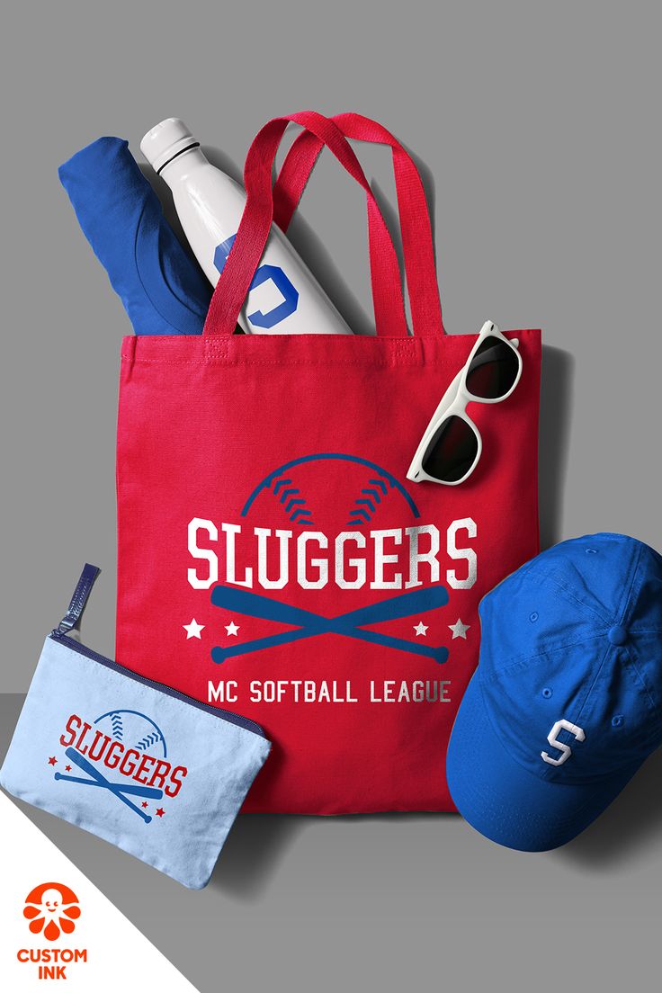 a bag, hat, sunglasses and other items are laid out on the floor to be used as an advertisement for sluggers