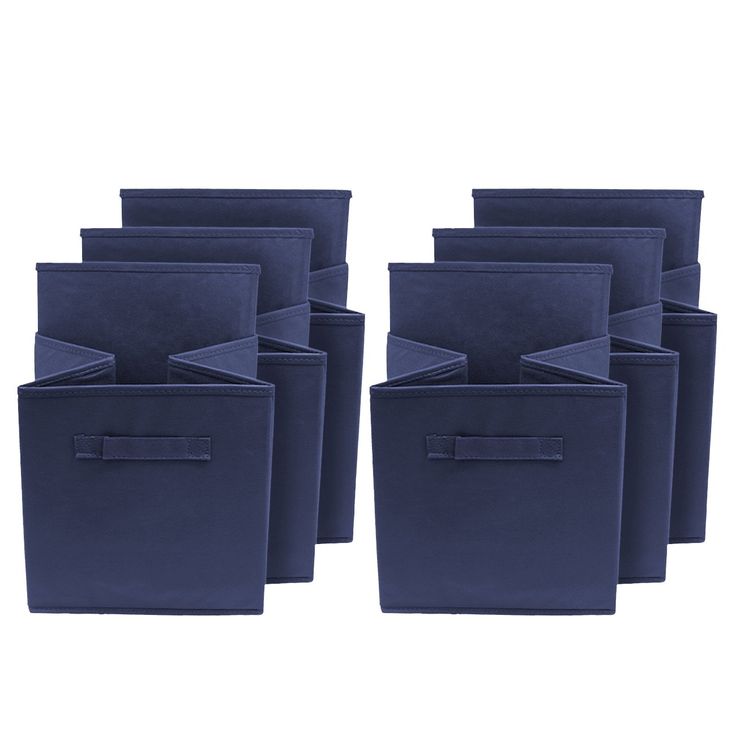 set of six navy blue linen storage bins with ties on each side and pockets at the bottom