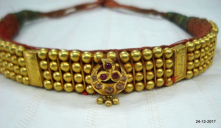 Vintage antique tribal old 22kt gold beads choker necklace from rajasthan India. Great design good for jewelry collection. Note - Gold beads are filled with wax. Please check pictures carefully for more detail. Groos weight - 73.5 grams Net gold weight approx - 24 grams Gold beads length - 26.7 cm (10.5 inches) Gold beads width - 2 cm (0.8 inches) Length free size can be adjsut by back thread knot. Handmade Traditional Temple Necklace For Festivals, Traditional Handmade Temple Necklace For Festivals, Adjustable Kundan Necklace For Puja In Temple Jewelry Style, Ceremonial Temple Jewelry With Gold Beads, Handmade Temple Necklace For Festivals, Handmade Kundan Necklace For Ceremonial Festivals, Traditional Yellow Gold Kundan Necklace For Rituals, Traditional Yellow Gold Kundan Necklace For Festivals, Bohemian Temple Necklace With Cutdana For Festivals