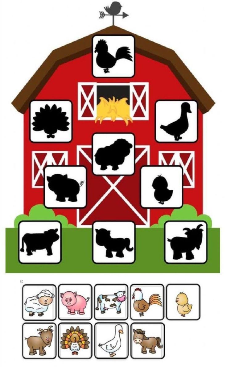 a red barn with farm animals on it