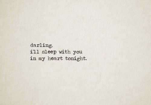 an old typewriter with the words daring, i'll sleep with you in my heart tonight