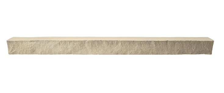 a long stone bench sitting on top of a white wall