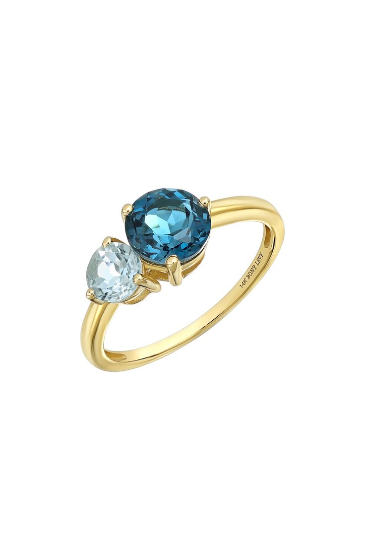 Two prong-set semiprecious stones bring vibrant sparkle to the center of this handcrafted 14-karat-gold ring and adds rich color to any stack. 1/2"W x 1/4"L setting Total stone weight: 1.43ct. 14k gold/blue topaz and peridot, blue topaz and citrine or blue topaz Imported Yellow Gold Topaz Rings In Fine Jewelry Style, Yellow Gold Topaz Rings Fine Jewelry, Multi-stone Yellow Gold Birthstone Ring In 14k, Multi-stone 14k Yellow Gold Birthstone Ring, Yellow Gold Multi-stone Birthstone Ring In 14k Gold, 14k Yellow Gold Multi-stone Birthstone Ring, Fine Jewelry Yellow Gold Topaz Ring With Center Stone, Fine Jewelry Yellow Gold Round Cut Gemstones, Yellow Gold Topaz Ring With Round Cut Gemstone