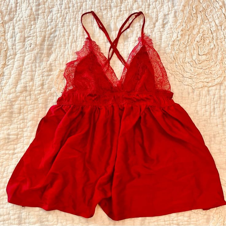 Lace Babydoll Size Xs True To Size Color: Red Excellent Condition, Never Worn Message Me With Questions Red Lace Trim Sleepwear For Night Out, Red Lace Trim Sleepwear For Summer, Flirty Red Sleeveless Sleepwear, Red Sleeveless Flirty Sleepwear, Red Camisole Sleepwear For Bedtime, Red Coquette Camisole Sleepwear, Red Coquette Style Sleepwear, Flirty Red Sleepwear For Summer, Flirty Red Summer Sleepwear