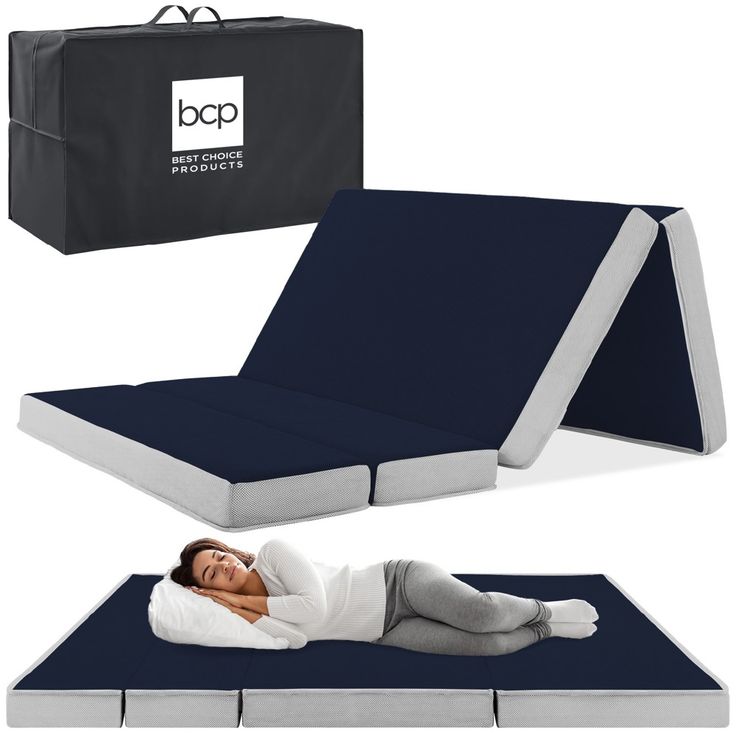 a woman laying on top of a blue mattress next to a black box with the logo bpp products