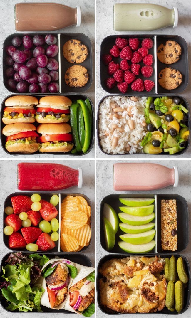 four different lunch boxes filled with fruits, vegetables and meats on top of each other