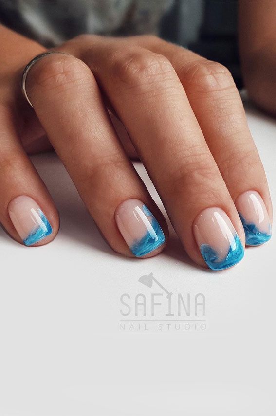 30. Ocean inspired nail art design I can’t tell you how much I love neutral nude nails but I also love to try out... Sea Wave Nails, Nails Inspired By The Ocean, Beach Waves Nail Art, Water Nail Trend, Wave Nails Design Simple, Sea Design Nails, Ocean Inspired Nail Art, Ocean Design Nails, Ocean Dip Nails