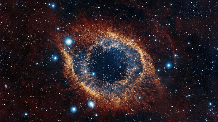 the eye of god in the sky is surrounded by stars and bright blue dusts