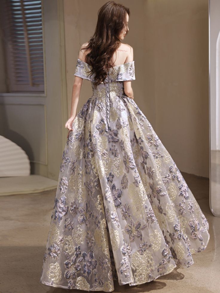 Turn every head at your next event with our Elegant Lavender and Gold Floral Off-Shoulder Ball Gown! This dress is designed to make you feel like royalty. The off-shoulder neckline beautifully showcases your shoulders and collarbone, adding a touch of elegance and sophistication to your look. Perfect for any party, this gown features a stunning floral pattern in lavender and gold. The rich colors and intricate design will make you the center of attention. Available in sizes S to 2XL, it offers a Off Shoulder Ball Gown, Gowns Dresses Elegant, Trendy Dress Outfits, School Season, Trendy Dress, Autumn Dress, Women's Evening Dresses, Skirt Co Ord, Pregnancy Outfits