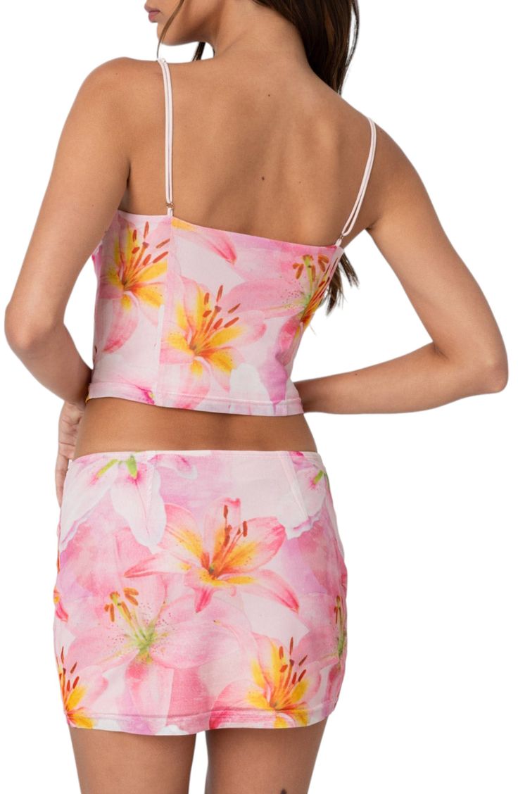 A subtle cowl neckline begins this stretchy figure-hugging crop top awash in a floral print. Cowl neck Spaghetti straps 100% polyester Machine wash, dry flat Imported Fitted Floral Print Top With Spaghetti Straps, Fitted Spaghetti Strap Top With Floral Print, Cropped Elastane Tank Top For Summer, Fitted Floral Print Tank Top For Vacation, Fitted Cropped Floral Print Crop Top, Fitted Floral Print Sleeveless Crop Top, Fitted Floral Print Cami Tank Top, Fitted Floral Print Camisole With Spaghetti Straps, Spring Fitted Camisole With Spaghetti Straps