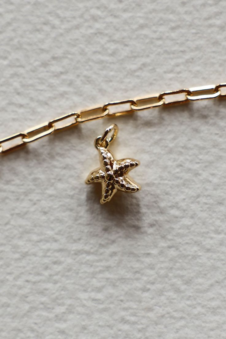 14K Gold filled dotted Starfish charm is sure to remind you of Laguna Beach and is sweet on an ocean themed charm necklace. This is fun yet easy to mix with all other charm styles. Hand make your custom charm necklace in Laguna Beach or build your piece online through adding a base necklace and your selection of charms. Leave us a note on your order for any special requests. Gold filled Tarnish resistant 3D charm Custom Charm Necklaces, Custom Charms, Ceramic Gifts, Laguna Beach, Swim Accessories, Gold Filled Jewelry, Jewelry Party, Ring Necklace, Starfish