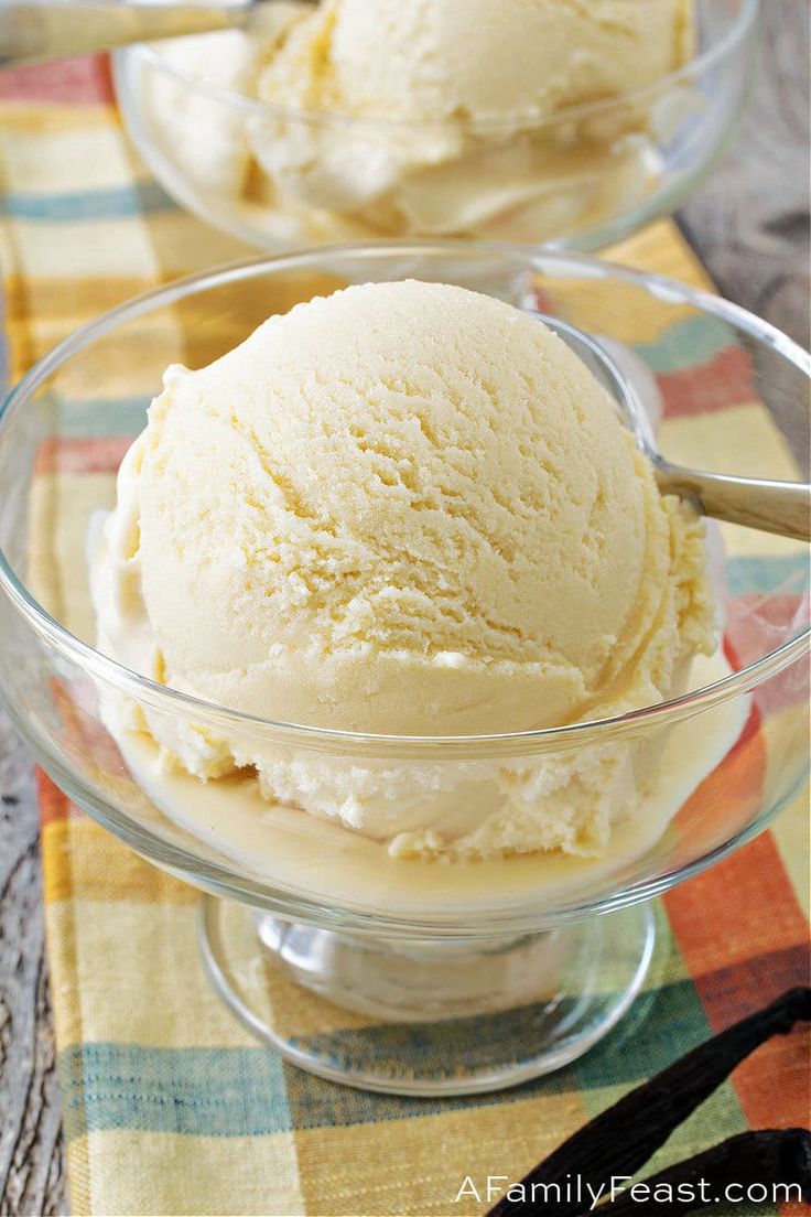 two bowls filled with ice cream on top of a table