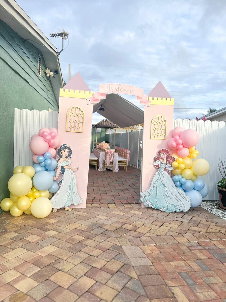 the entrance to a princess themed birthday party