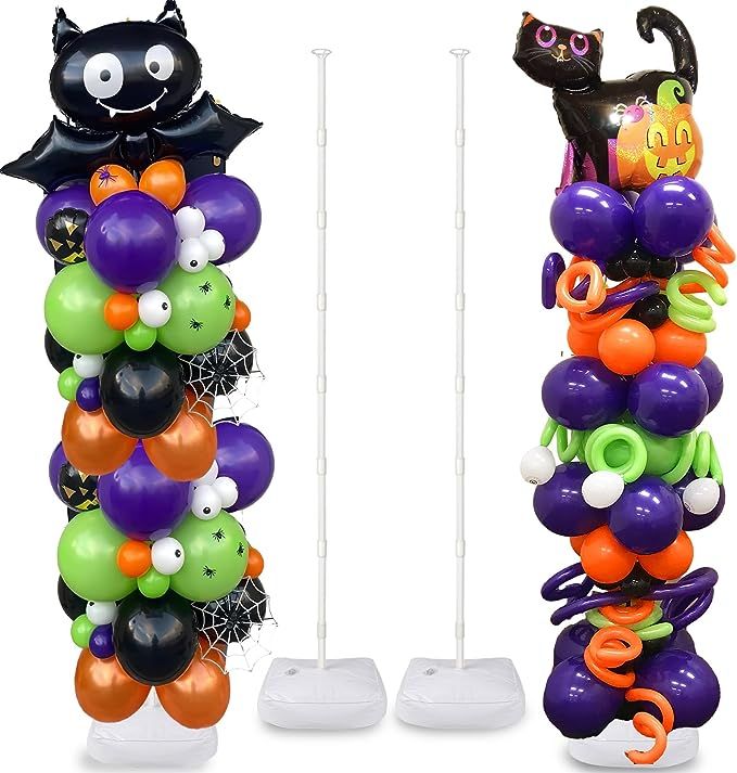 halloween balloons and decorations are arranged in the shape of letters i - v, with black cats on them