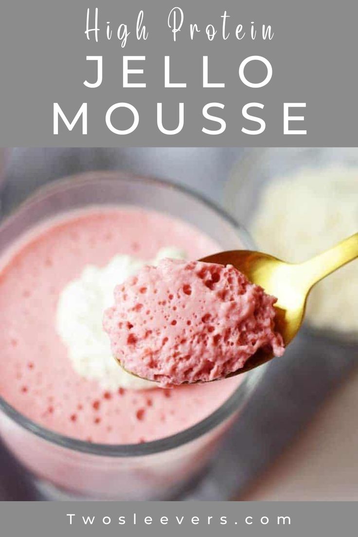 a spoon full of pink jello and cream with the words, high protein jello mousse