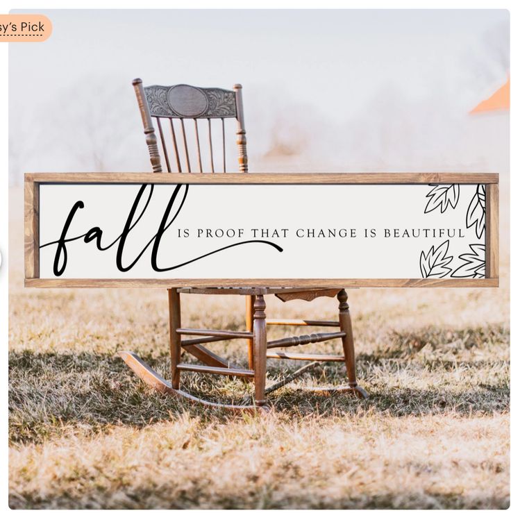 a wooden sign that says fall is proof that change is beautiful on top of a rocking chair