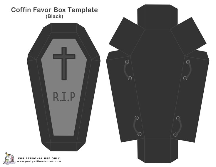 a paper box that is shaped to look like a grave with a cross on it