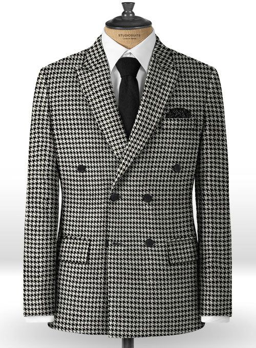 In black and white, the double breasted tweed blazer boasts a heritage inspired houndstooth check design for a modern take on a menswear classic. Wear this statement-making design with its matching trousers, a white crew-neck t-shirt and black boots for a novel take on a tailored look. 
 
 Look Includes  Big Houndstooth BW Tweed Fabric  Double Breasted Jacket Style  Peak Lapel  Real Horn Royal Buttons  Single Vent  Three Cuff Buttons   
 You can change the look during customization if required. Tailored Tweed Blazer With Houndstooth Pattern, Tweed Houndstooth Blazer With Notch Lapel, Tailored Tweed Sport Coat With Houndstooth Pattern, Tailored Houndstooth Tweed Jacket For Business, Business Tweed Sport Coat With Houndstooth Pattern, Business Tweed Houndstooth Sport Coat, Business Tweed Jacket With Houndstooth Pattern And Suit Collar, Double-breasted Houndstooth Blazer, Elegant Double-breasted Houndstooth Tweed Jacket