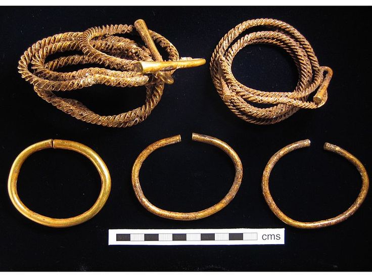 an assortment of gold rings and ropes