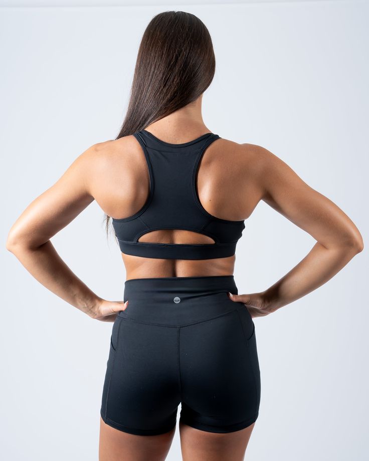 Get where you're going in style and comfort with our fan-favorite running sports bra. Featuring a racerback, wire-free construction, this performance bra has flat, chafe-resistant seams for maximum comfort. Other features include a back pocket to stash necessities, removable cups, medium impact support, and cool, slick feel. It's tried and true - just check out the reviews! High Stretch Sports Bra With Built-in Padding For Training, Functional Sports Bra With Built-in Bra For Training, Supportive Fitted Sports Bra With Built-in Padding, Functional Activewear With Built-in Padding For Sports, Athleisure Sports Bra With Built-in Padding, T-back, Sporty T-back Sports Bra For Gym, Athletic Fit Sports Bra With Built-in Bra For Training, Running Sports Bra With Built-in Padding, Functional T-back Sports Bra For Workout