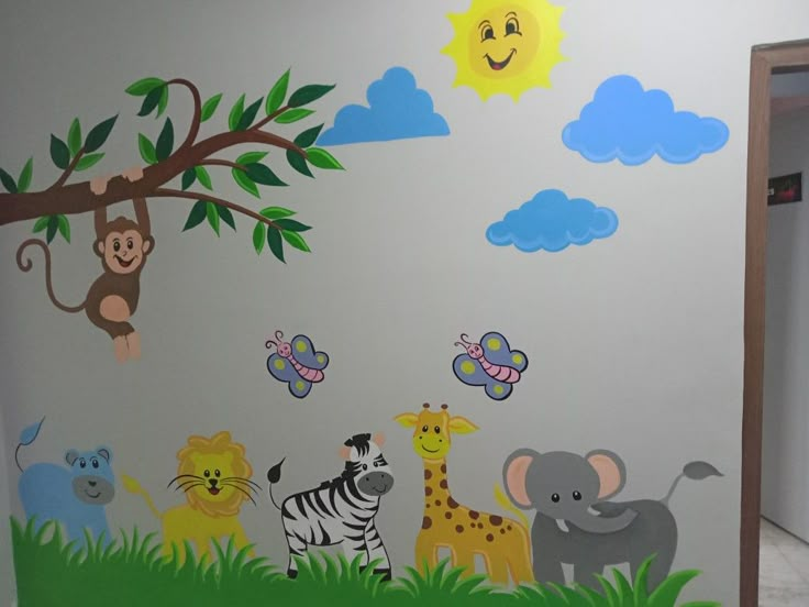 this is a wall mural with animals and trees on the walls in a children's room