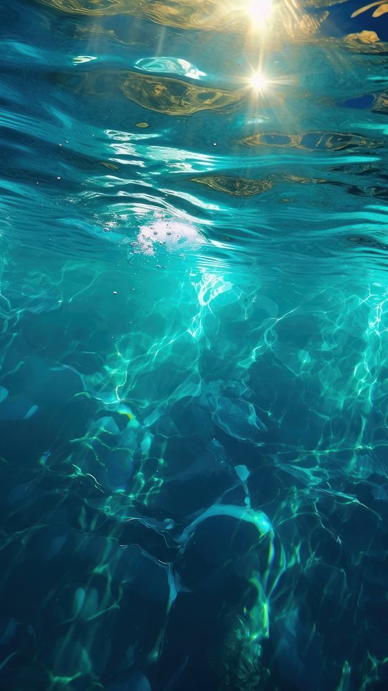 the sun shines brightly through the water's surface as it reflects on the ocean floor