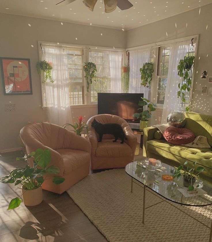 a living room filled with furniture and a fire place