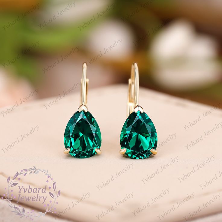 "❤Jewelry Details -Gold Type : Solid 14K Gold / Solid 18K Gold (Choose One in Material Option) -Center Stone: Lab Created Emerald 6*8mm, Approximately 1.35ct*2pcs Color: Green--- 5A Clarity: VVS Cut: Pear Cut / 3EX Earring Width: 6mm Earring Length: 14.5mm SKU: YE0080 ~*-*~Purchase Guarantee: - All our jewelry is handmade, and each process is refined. - 14 Day Refund Guarantee. - All our products are Free Shipping. - Free Gift Box&Packing. ~*-*~Please contact us if you need service: 1. Ring Resizing. 2. Metal Change(PT950/10k/14k/18k White/Yellow/Rose Gold). 3. Engraving ring (less than 10 letter). 4. Accept customization. We believe that our quality, attention to detail, design and customer service make us stand out from the competition. If you have any questions, please let me know and I 14k Gold Drop Bridal Earrings As Gift, 14k Gold Bridal Drop Earrings For Gift, Elegant Birthstone Earrings For Wedding, Pear-shaped Emerald Earrings For Wedding, May Birthstone Earrings For Wedding, Formal Pear-shaped Emerald Earrings, Fine Jewelry Birthstone Earrings For Wedding, Anniversary Yellow Gold Teardrop Earrings With Ear Wire, Gold Birthstone Earrings For Wedding